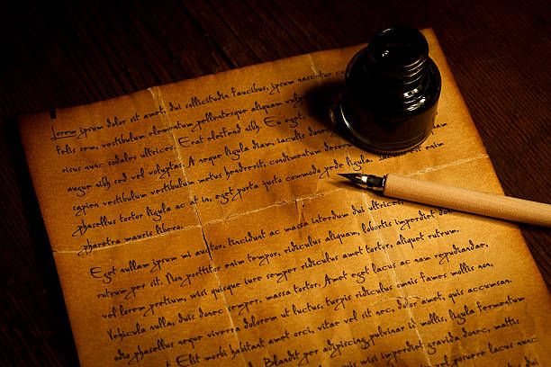 istock Pen and inkwell on antique  paper 464397209