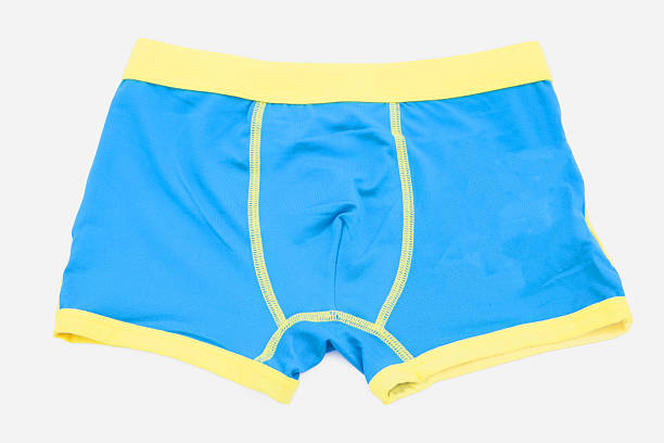 istock Children's blue swimming shorts isolated on white background. 464397494