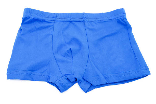 istock Children's blue swimming shorts isolated on white background. 464397520