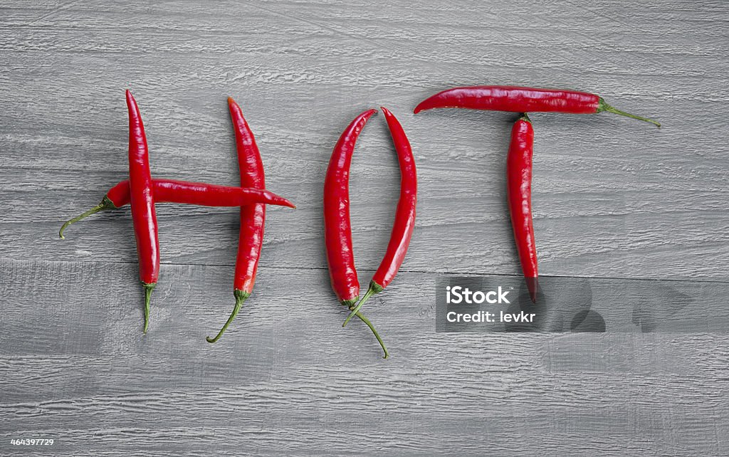 Hot chili pepper Fresh hot chili pepper on wooden vintage table Backgrounds Stock Photo