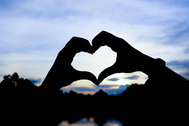 istock Hands and fingers in heart shape 464398226