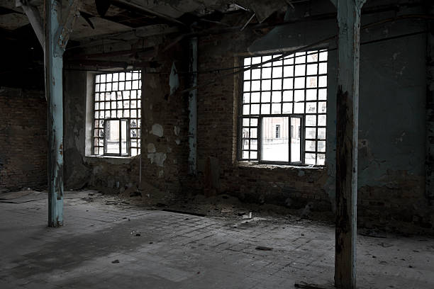 istock two old windows in abandoned factory hall 464398348