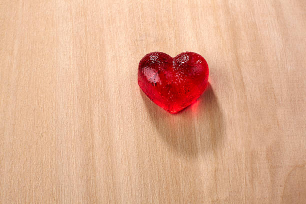 istock Valentines day, red sweet candies in heart shape 464401263