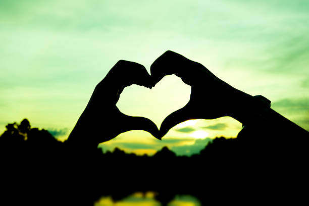 istock Hands and fingers in heart shape 464401576
