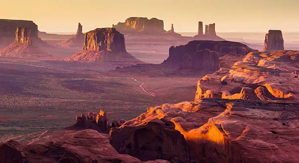 A stunning sunset on the Monument Valley, photographed from the remote rock formation known as The Hunt's Mesa