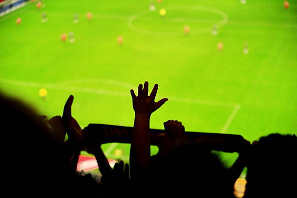 istock Spectators fans football 464402109