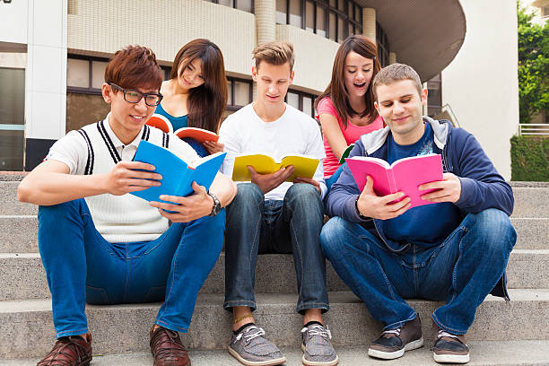 istock Happy  young group of students study together 464402158