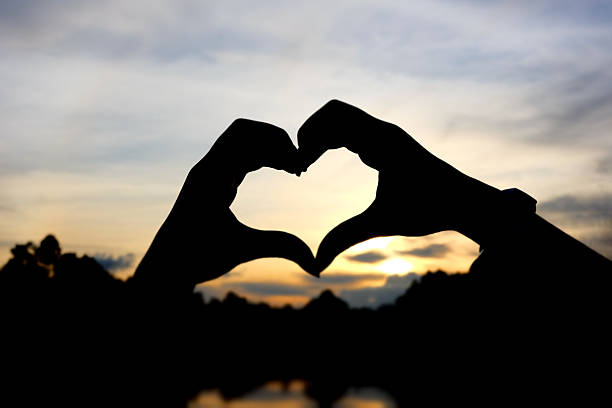 istock Hands and fingers in heart shape 464402890