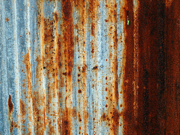 istock Rusty corrugated iron metal fence close up/ Zinc wall 464403767