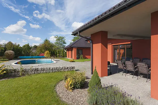 Photo of Garden pool and house