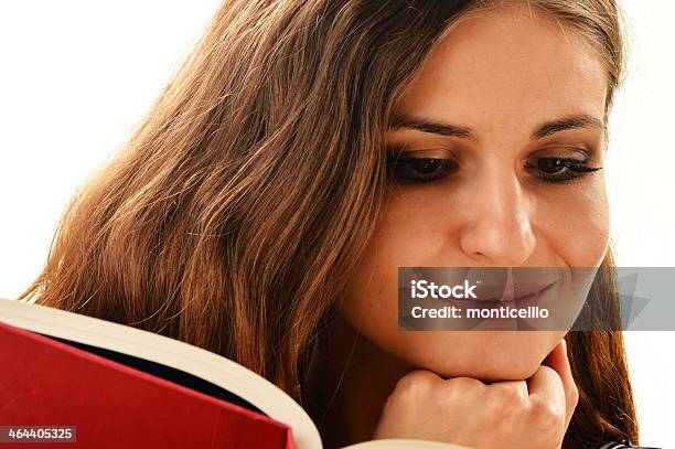 Young Woman Reading A Book Isolated On White Stock Photo - Download Image Now - Adult, Art, Art And Craft