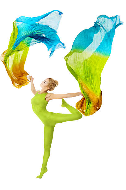 istock Woman dancing with flying colorful fabric 464405833