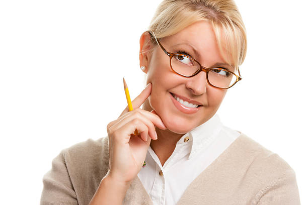istock Thinking Woman with Pencil Looking Up and to the Left 464407678