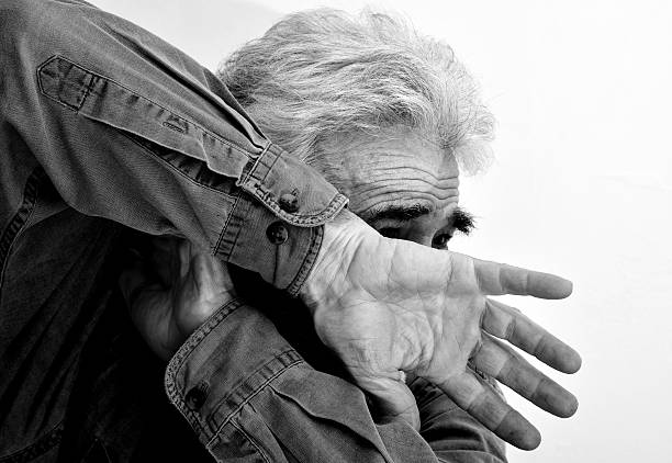 protecting himself stock photo