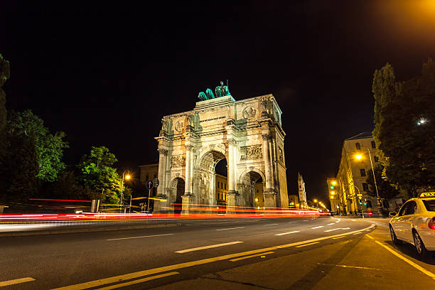 Arch of Victory in Munich at night Arch of Victory in Munich at night  siegestor stock pictures, royalty-free photos & images