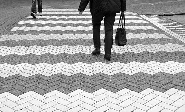 istock Zebra crossing with two people 464415989