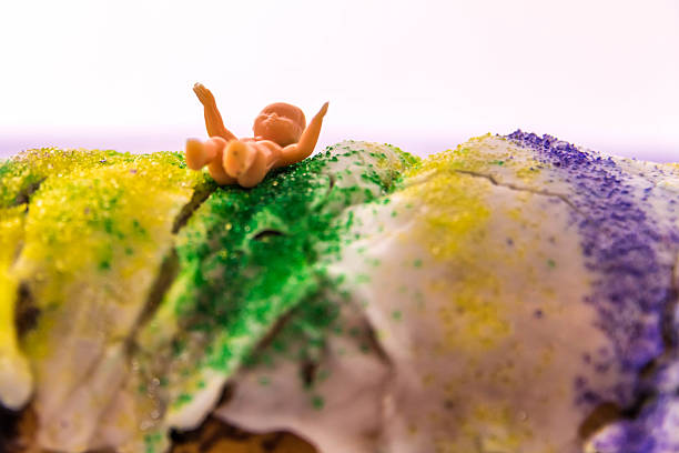 istock Mardi Gras King Cake with baby 464419906