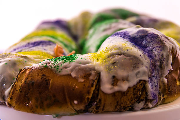 istock Mardi Gras King Cake with baby 464419928