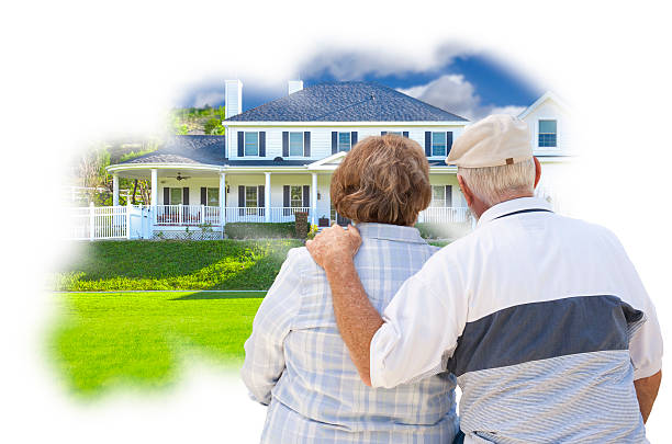 istock Daydreaming Senior Couple Over Custom Home Photo Thought Bubble 464420060