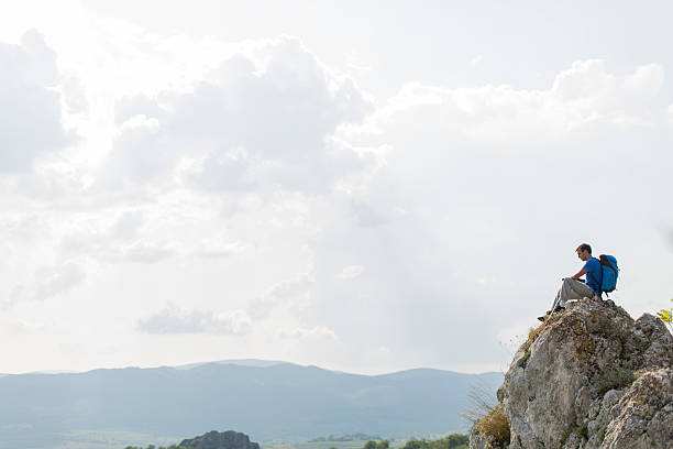 istock Young man hiking on the mountain 464420930