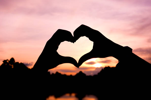 istock Hands and fingers in heart shape 464421334