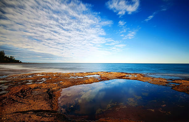 Rock Pools Rock pools on the shore of Caloundra on Queensland's Sunshine Coast caloundra stock pictures, royalty-free photos & images