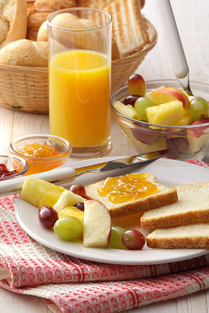 istock Breakfast: Toast, Fruit Salad and Orange Juice 464423856