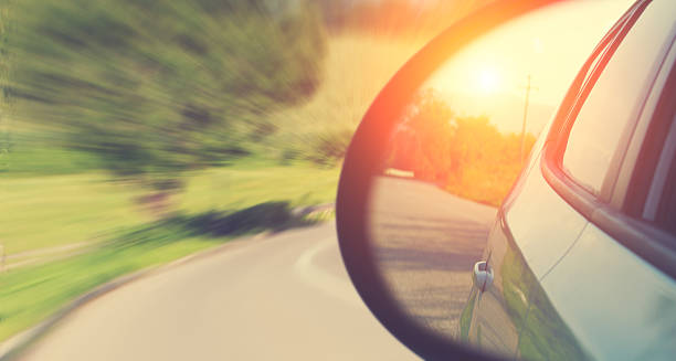 istock A car in motion on the road on a sunny day 464424400