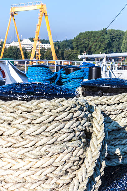 istock Dock cleat with boats at marina 464425126