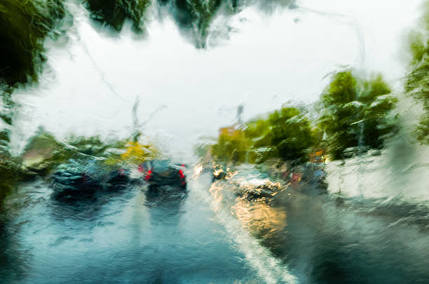 istock Traffic in heavy rain storm 464426322