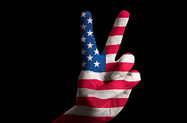istock america national flag two finger up gesture for victory 464426554
