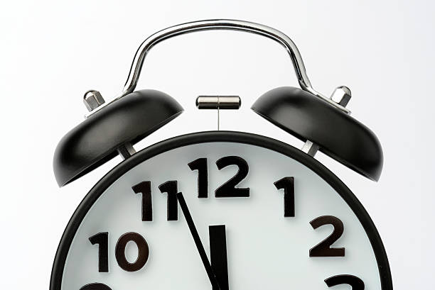 istock Close-up of Black Table Alarm Clock on White Background 464436170