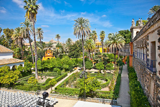 Real Alcazar Gardens in Seville, Spain on a nice day Real Alcazar  "Reales Alcazares" gardens in Seville, Andalusia, Spain alcazares reales of sevilla stock pictures, royalty-free photos & images