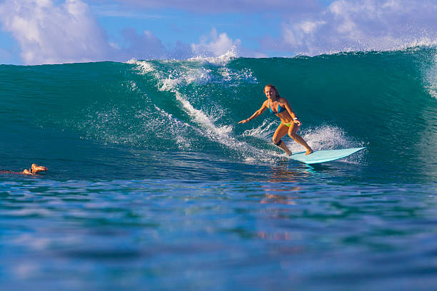 istock Surfer girl on Amazing Blue Wave 464442268