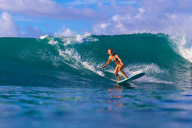 istock Surfer girl on Amazing Blue Wave 464442272