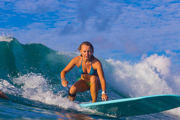 istock Surfer girl on Amazing Blue Wave 464442282