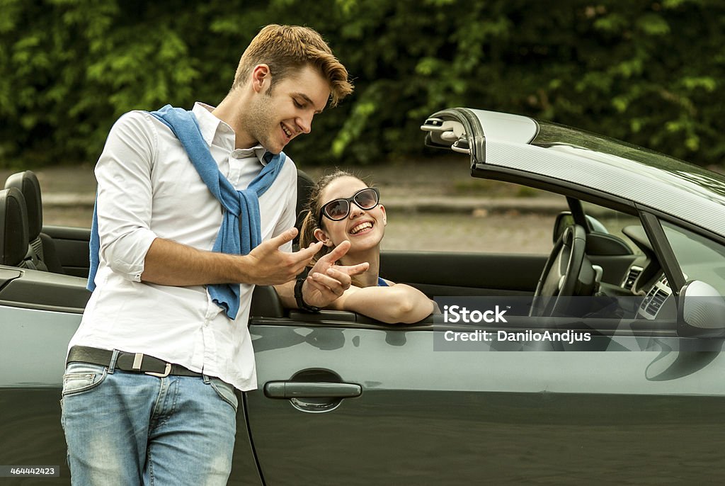 cheerful couple talking cheerful couple talking and laughing outdoors Belt Stock Photo