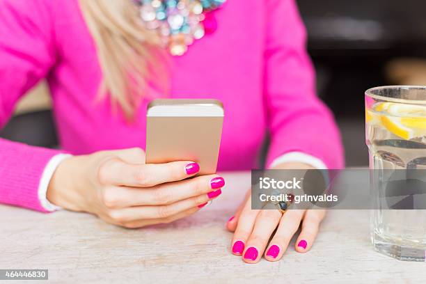 Woman Using Mobile Phone In Cafe Stock Photo - Download Image Now - 2015, Adult, Brunch