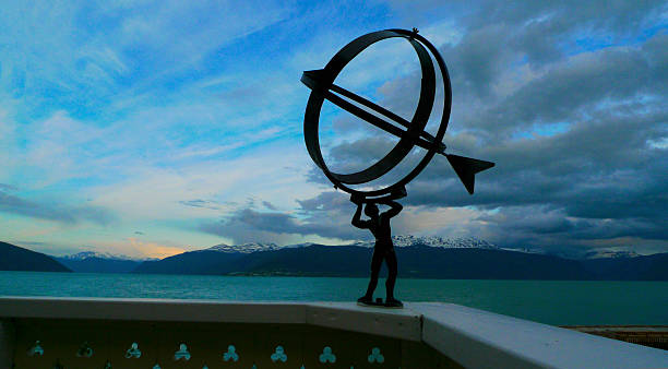 A sundial painted on a house wall in Switzerland