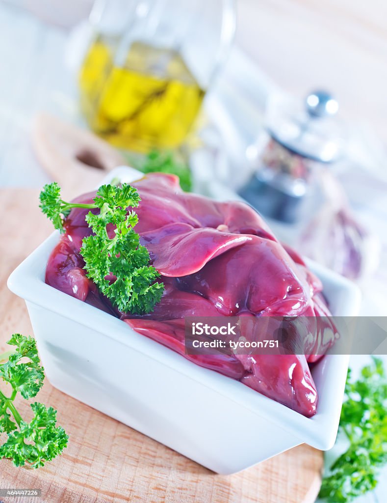 raw liver raw liver in bowl and on a table 2015 Stock Photo