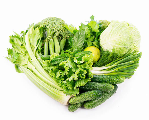 istock fresh green vegetables isolated on white 464447474
