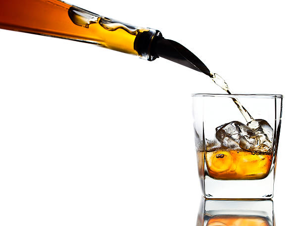 istock whiskey and natural ice isolated on white 464448054