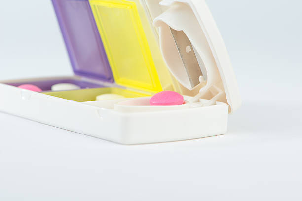 Closed up aluminum blade and pink tablet