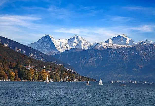 Lake Thun with Jungfrau mountain range near Oberhofen, Switzerland