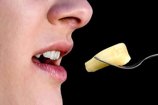 istock Woman Eating Peaches 464450933