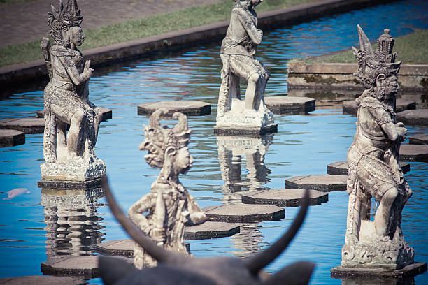 istock Balinese god at water background 464451024
