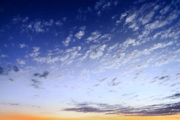 istock beautiful clouds illuminated by the sun at sunset 464454544