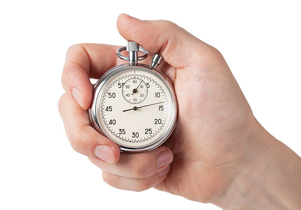 Close up of hand holding stopwatch, isolated on white background Close up of hand holding stopwatch, isolated on white background arm span stock pictures, royalty-free photos & images
