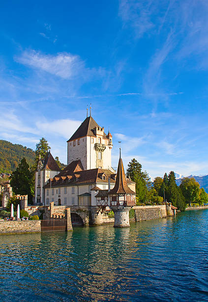 Lake Thun Oberhofen castle on the lake Thun, Switzerland lake thun stock pictures, royalty-free photos & images