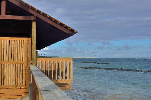 istock Wooden hut overlooking sea 464456482